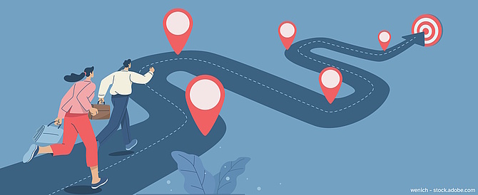 Symbolgrafik: Eine Straße mit Wegmarken führt auf eine Zielscheibe zu. (wenich - stock.adobe.com)