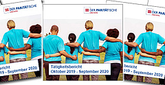 Tätigkeitsberichte des Paritätischen Wohlfahrtsverbands Sachsen liegen nebeneinander. 